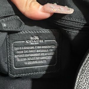 metallic leather coach in good condition